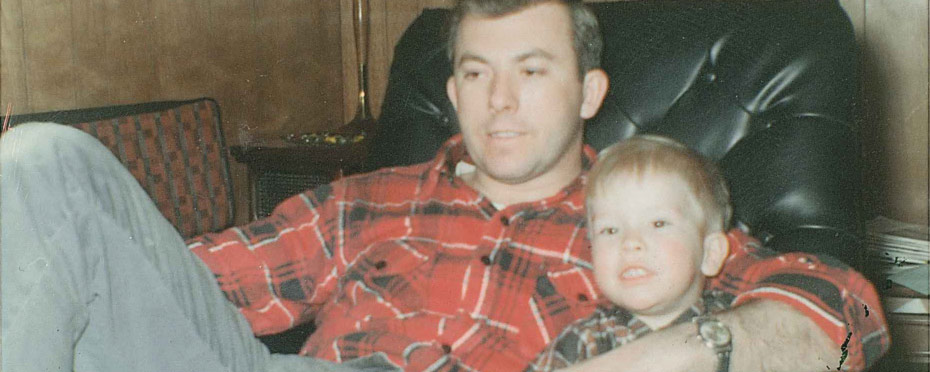 A photo of a young John Delaney with his father